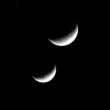 Вид на Диону и Тетис через фото камеру зонда Касcини